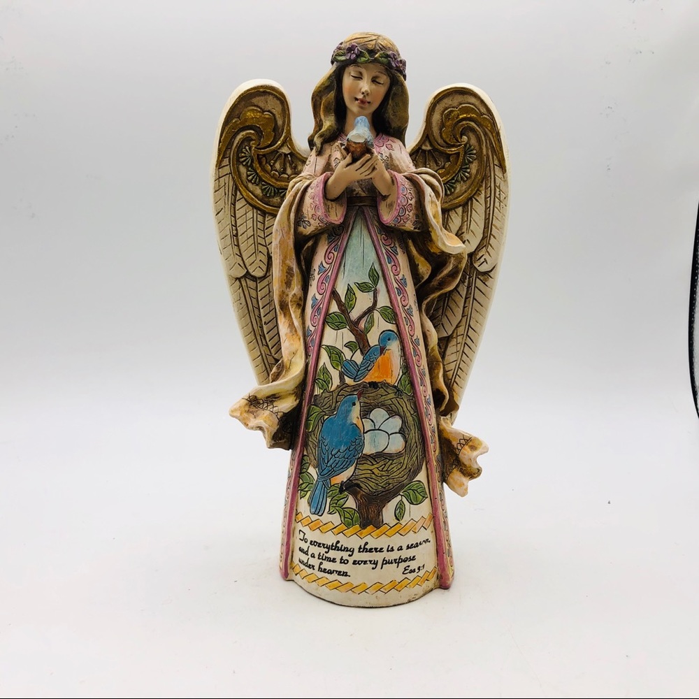 Angel figure by Roman, INC.  Angel holding Robin. Faux Wooden Carving. 10” tall
